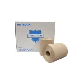 Rolls of kraft hardwound towels in front of their box.